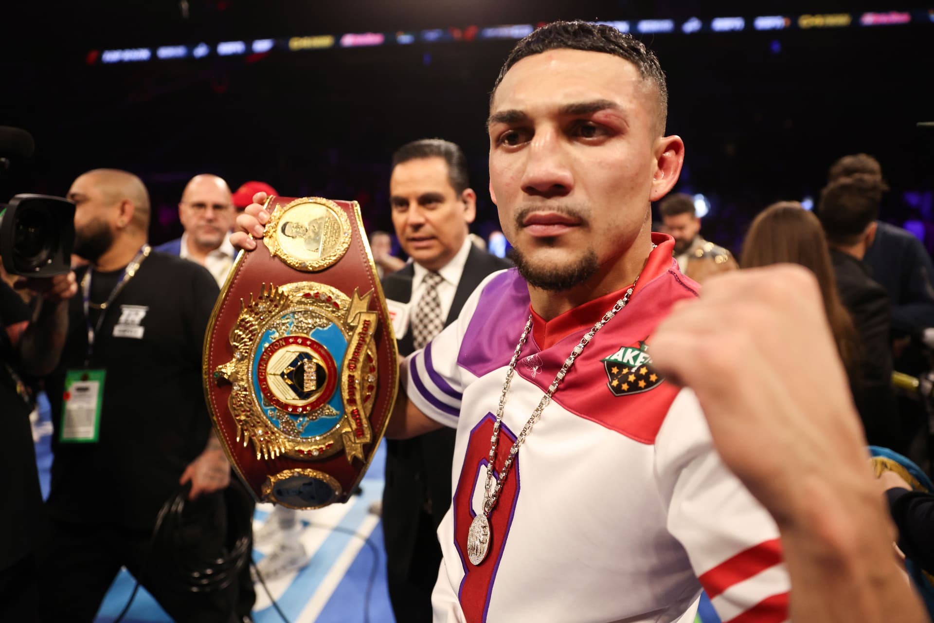 Teofimo Lopez celebrates defeating Jamaine Ortiz 
