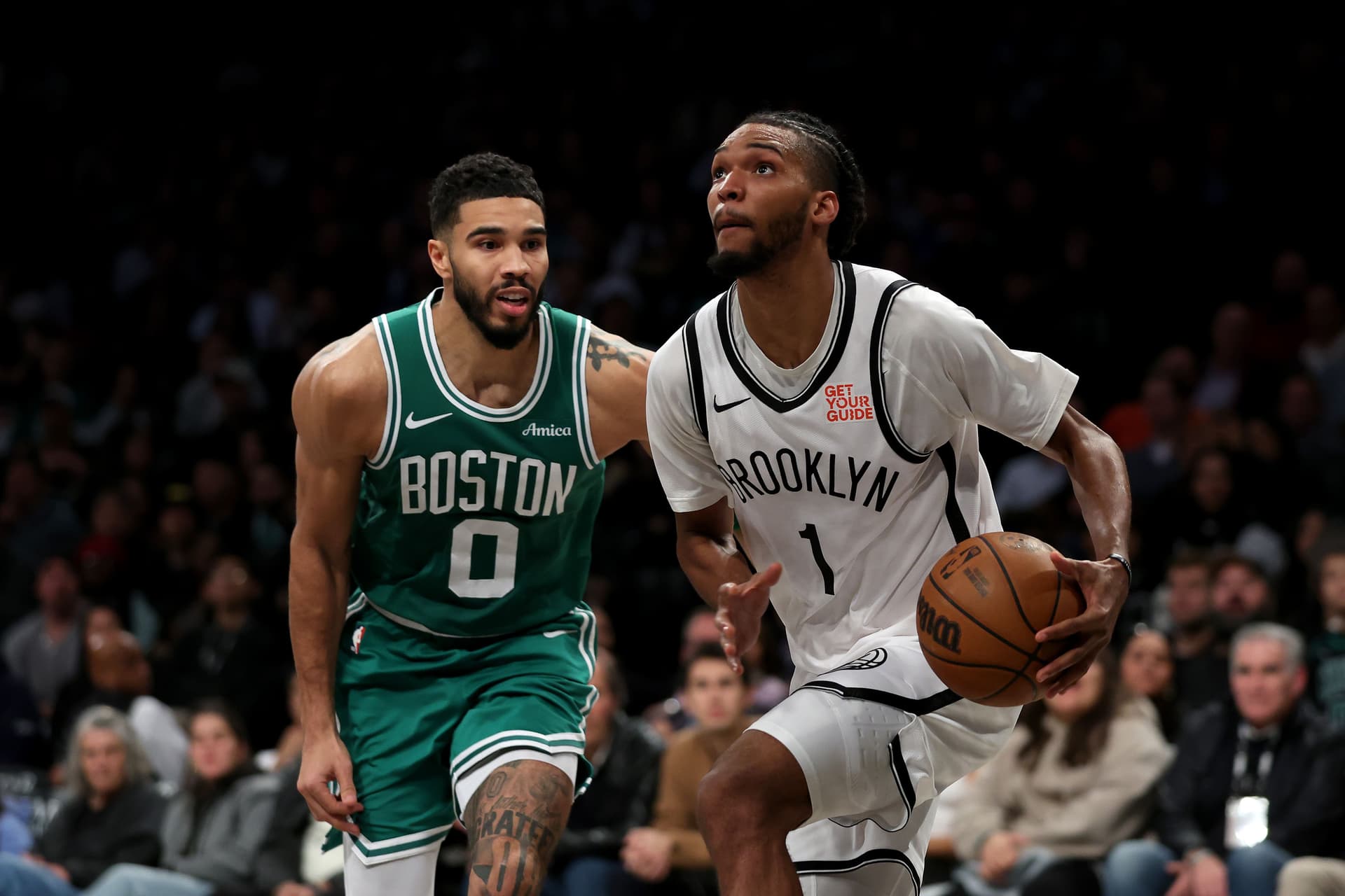 Ziaire Williams drives against Jayson Tatum