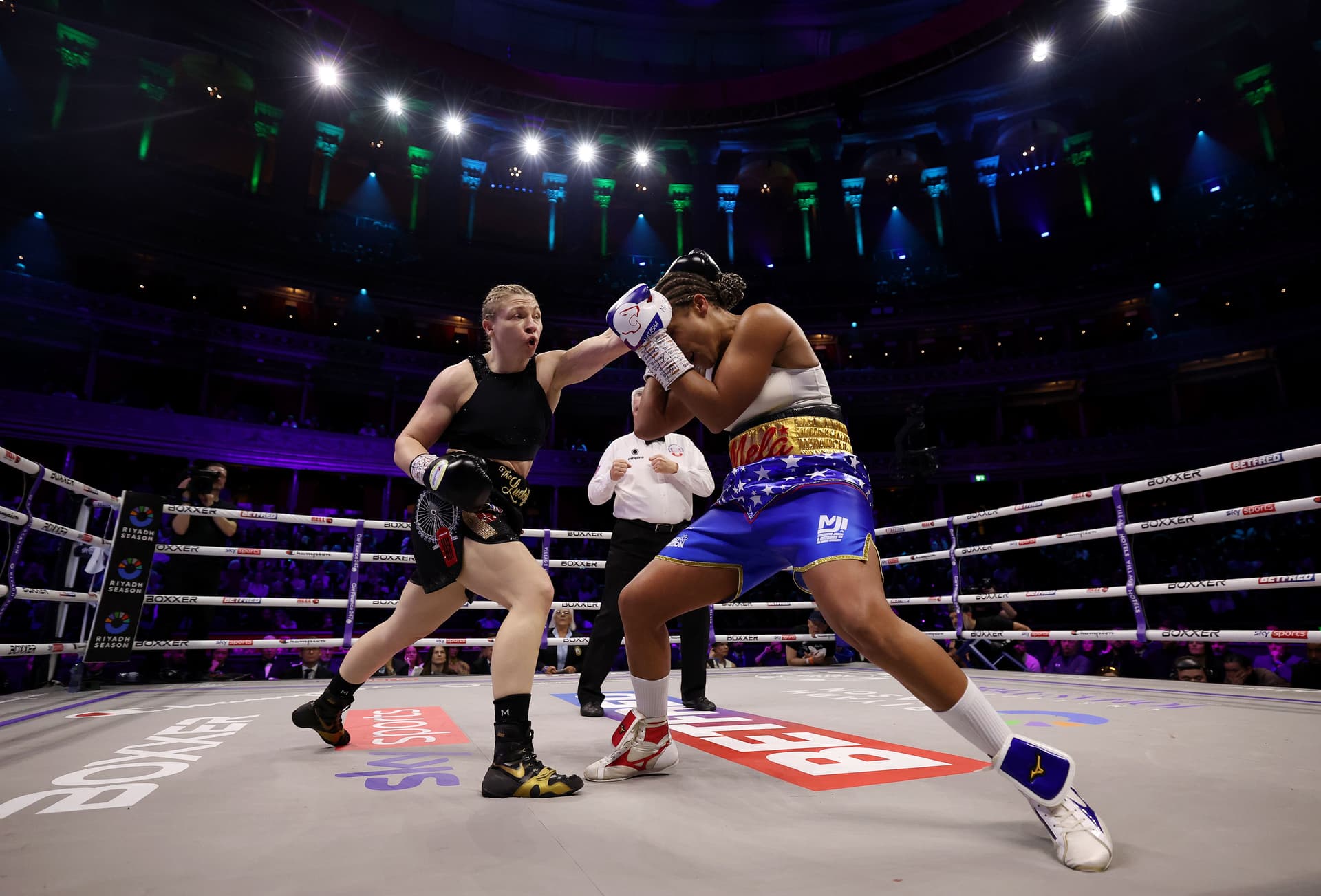 A general view as Lauren Price punches Natasha Jonas during the WBC World Lightweight Title