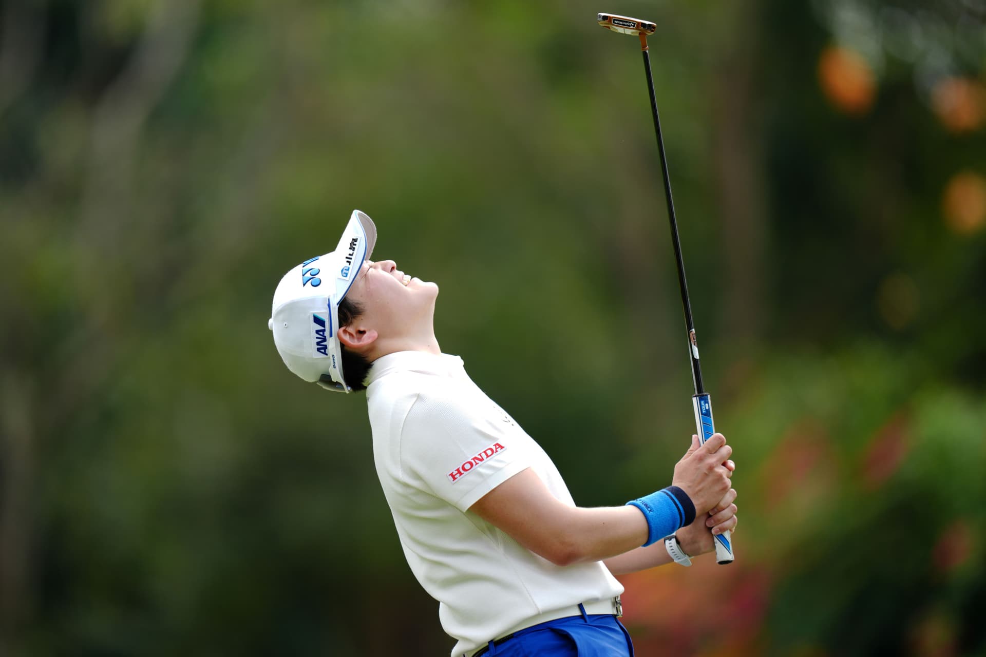 Akie Iwai of Japan reacts missing the par putt on the 17th green