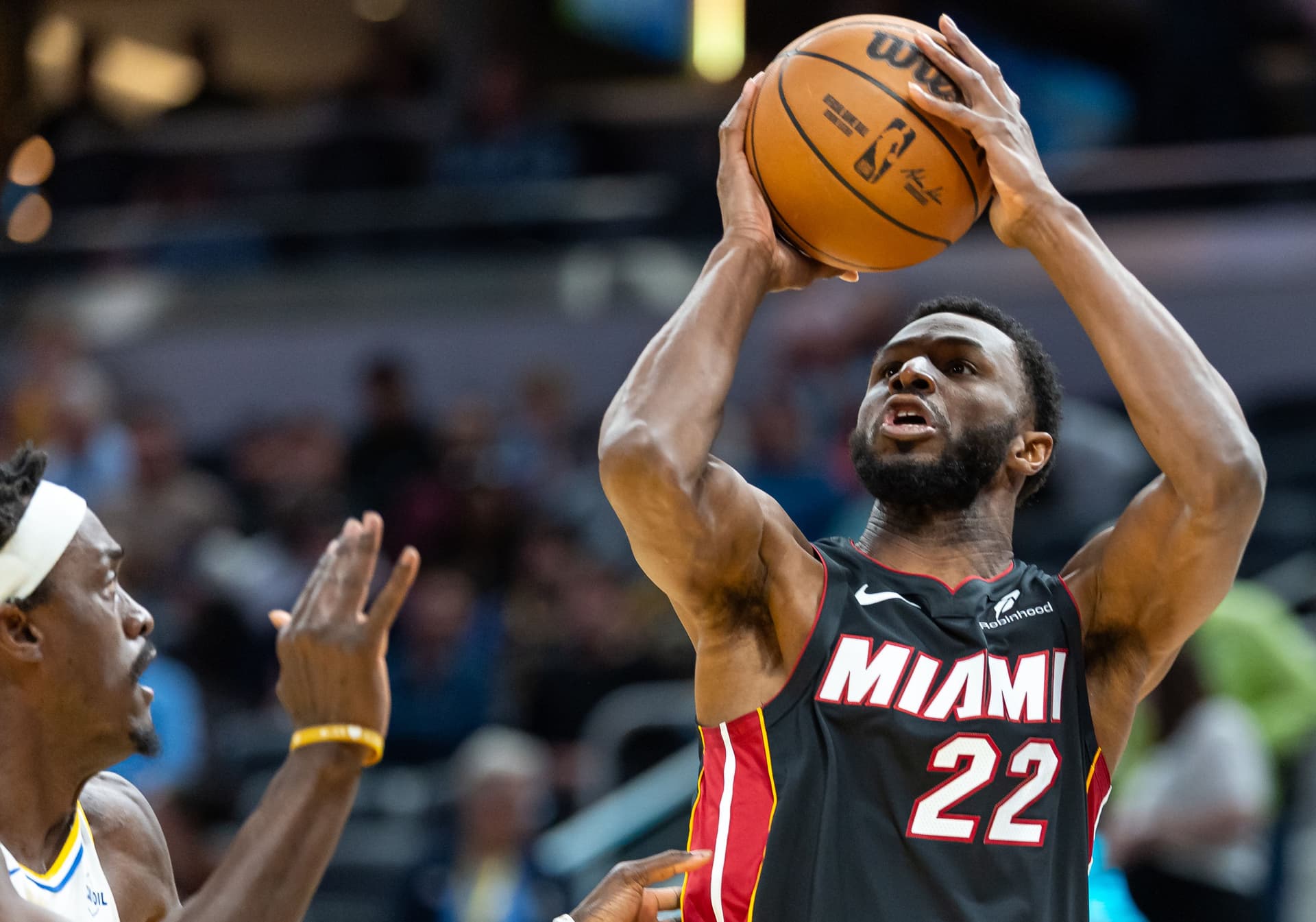 Andrew Wiggins #22 of the Miami Heat shoots the ball against Pascal Siakam