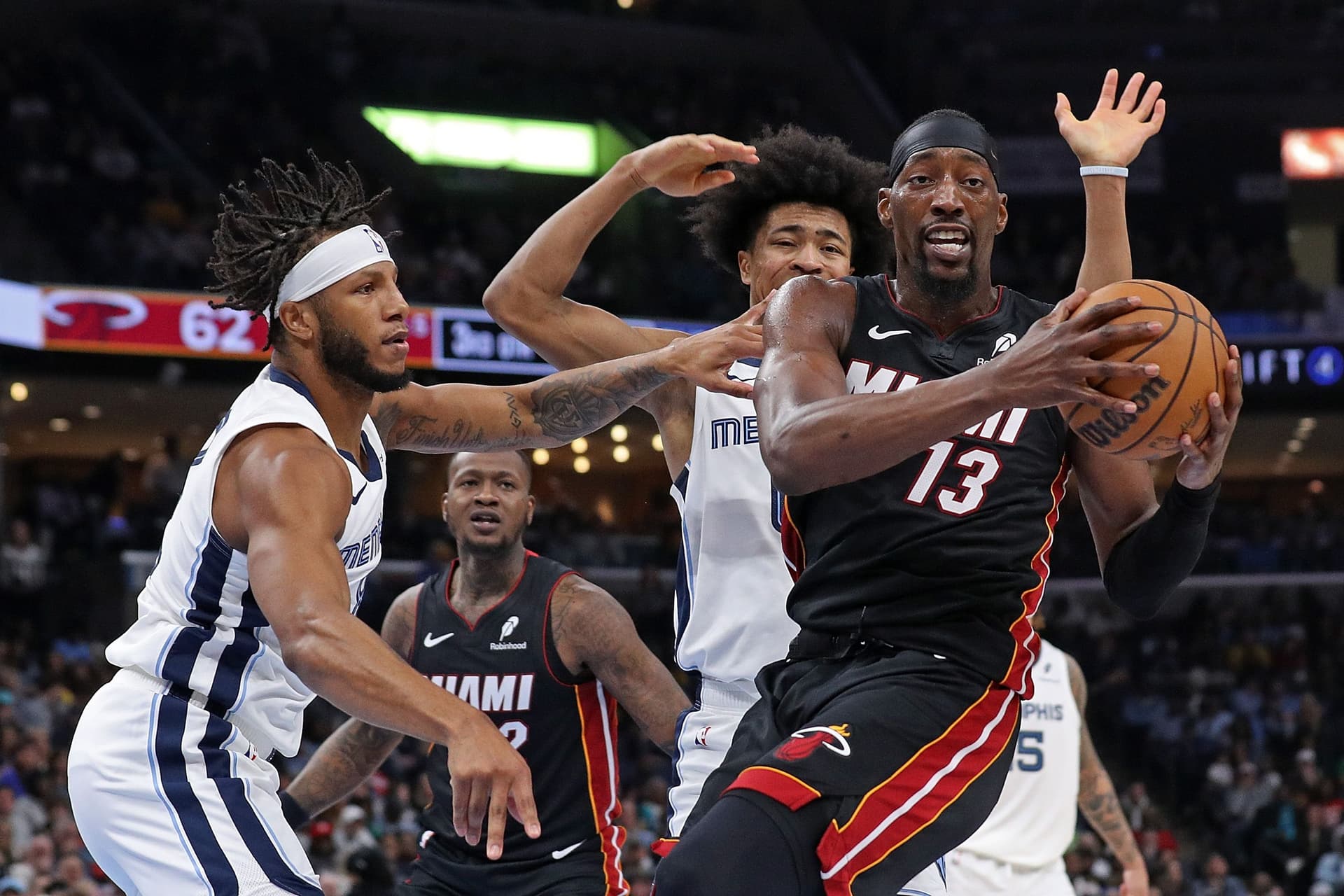 Bam Adebayo #13 of the Miami Heat handles the ball during the second half against the Memphis Grizzlies at FedExForum