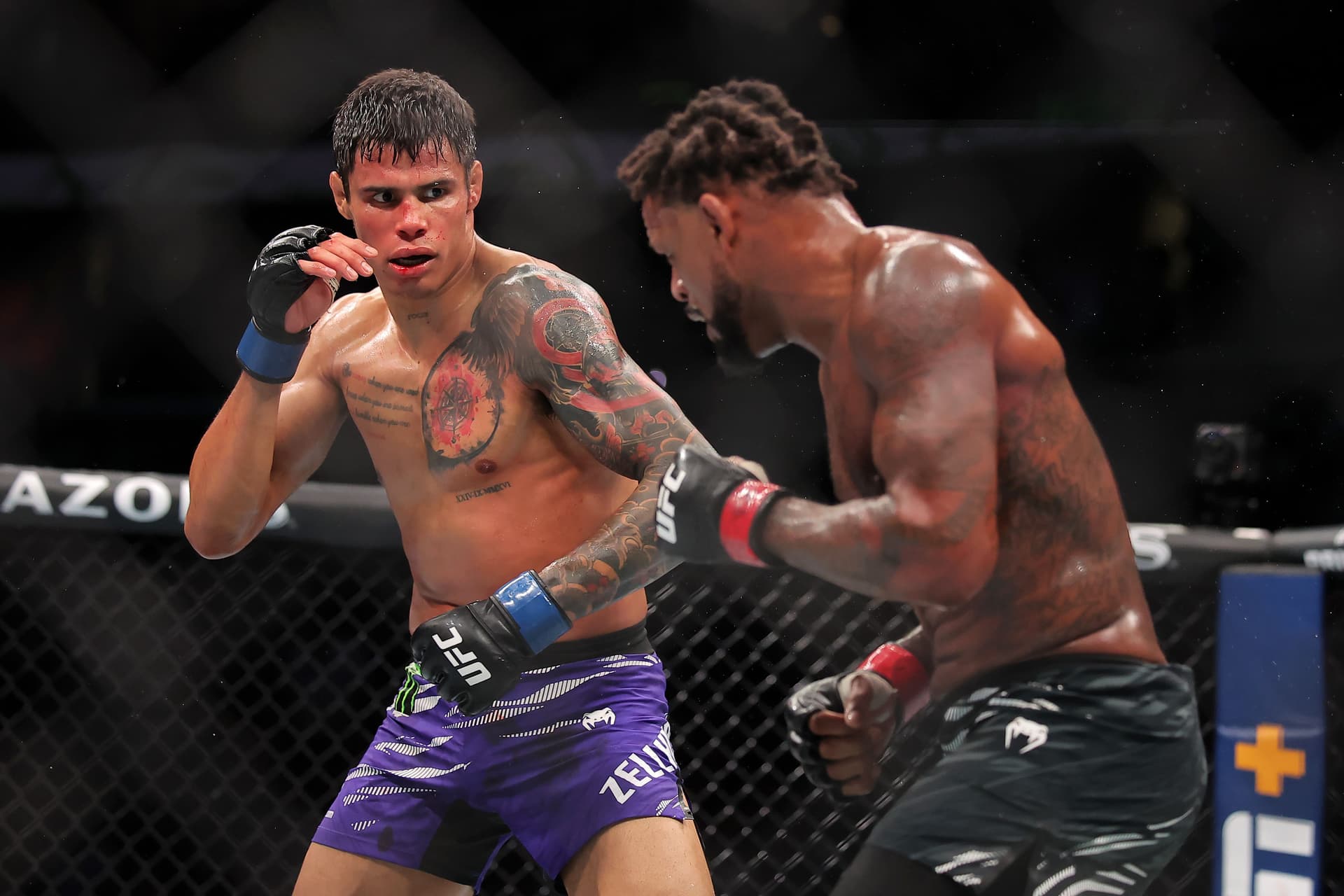 Daniel Zellhuber of Mexico (L) and Michael Johnson of the United States face off