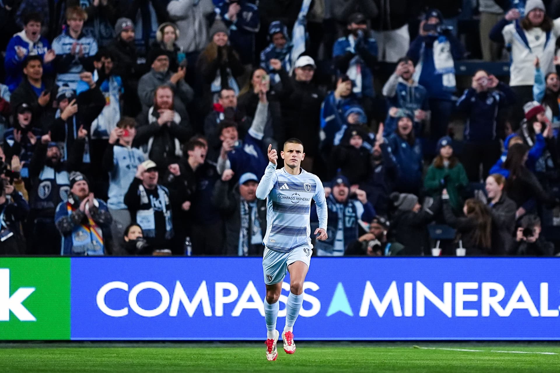 Dejan Joveljic #9 of Sporting Kansas City celebrates after scoring the team's first goal.jpg