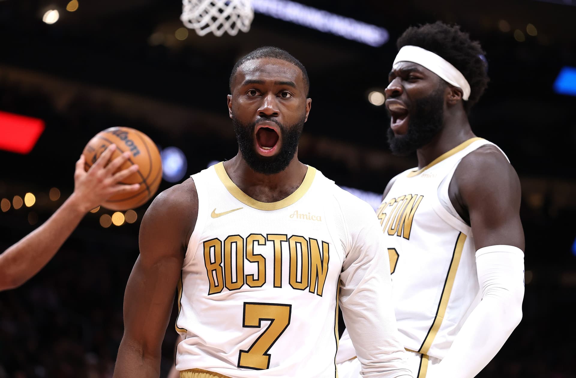Jaylen Brown #7 of the Boston Celtics reacts after drawing a foul