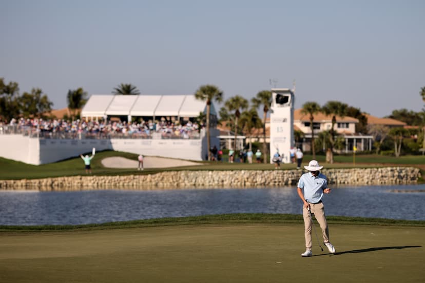 Joe Highsmith of the United States reacts to a putt on the 14th green