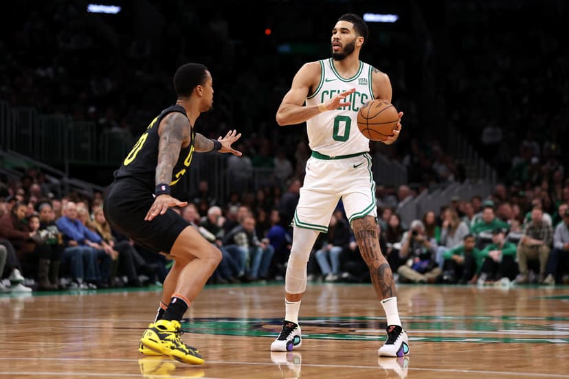 John Collins #20 and Jayson Tatum #0 /Getty Images