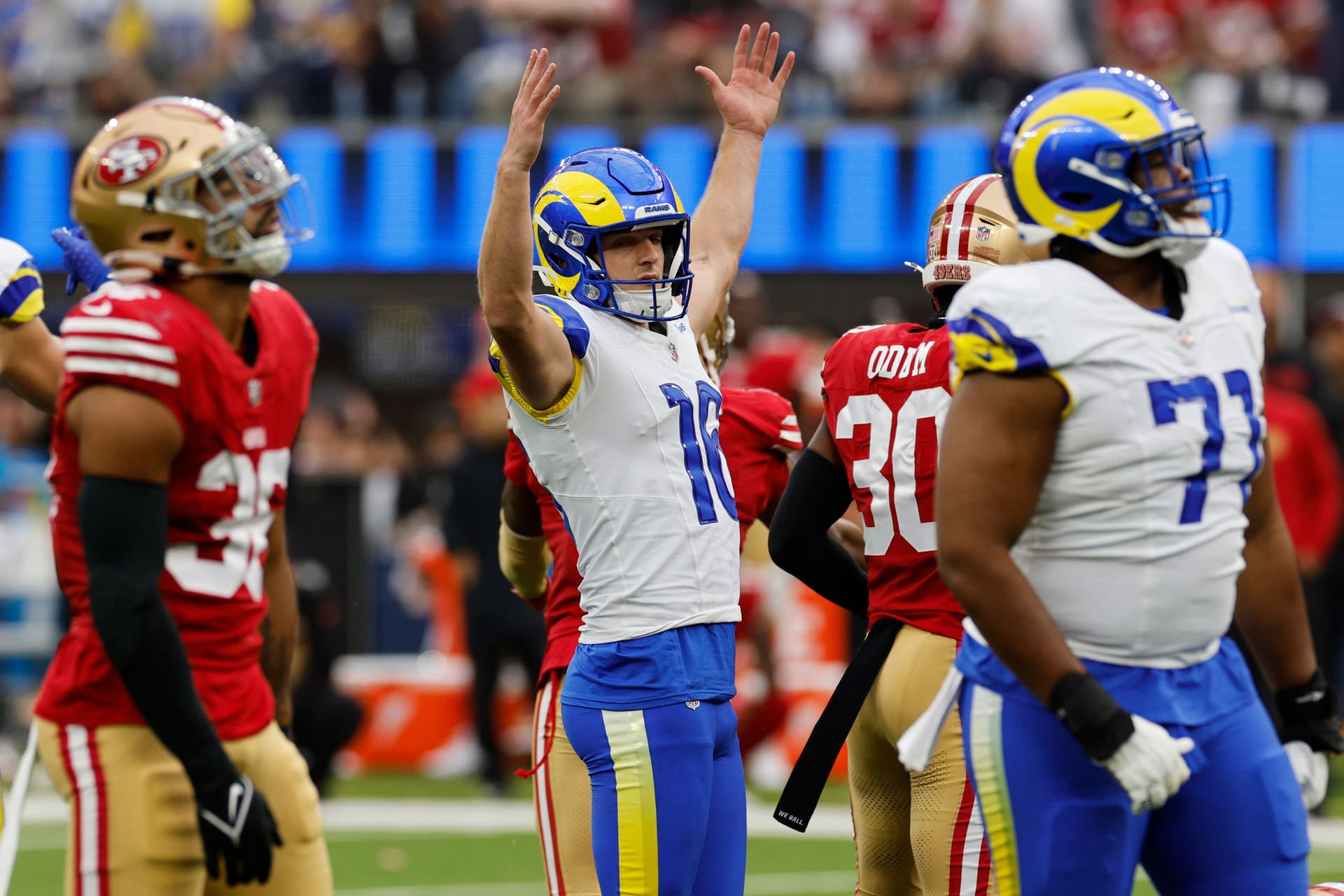Kicker Joshua Karty celebrates a game-winning field goal against the San Francisco 49ers