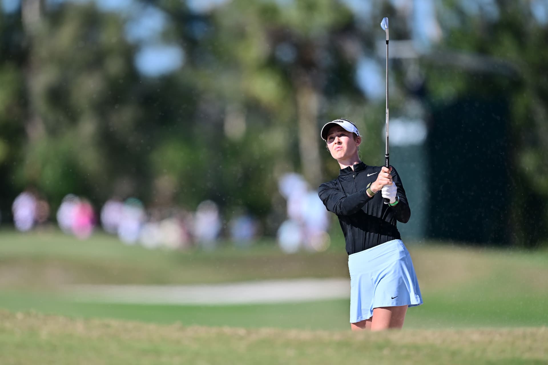 Nelly Korda of the United States plays a shot from a bunker on the 12th hole