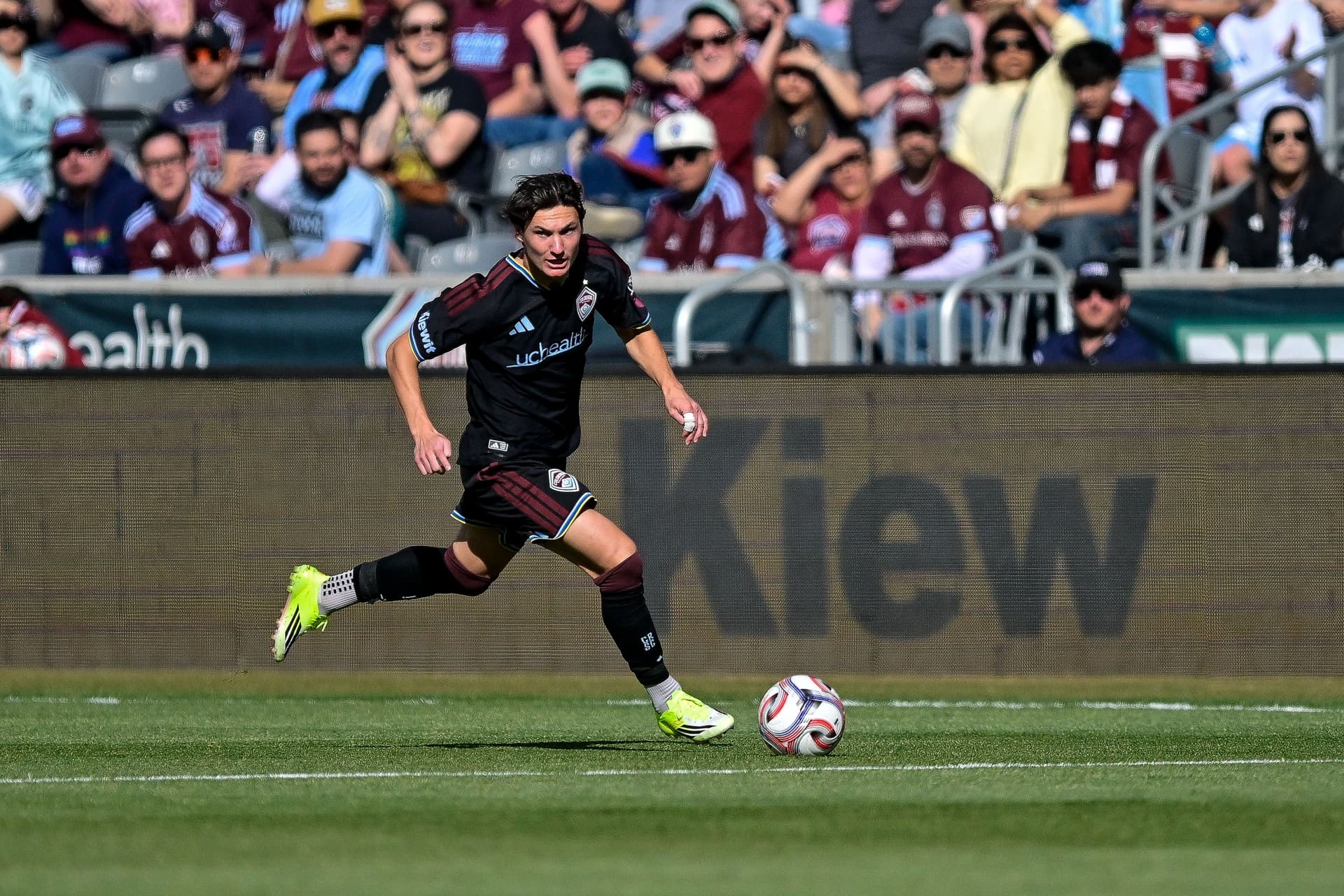 Paxten Aaronson #10 of the Colorado Rapids runs with the ball in the first half.jpg