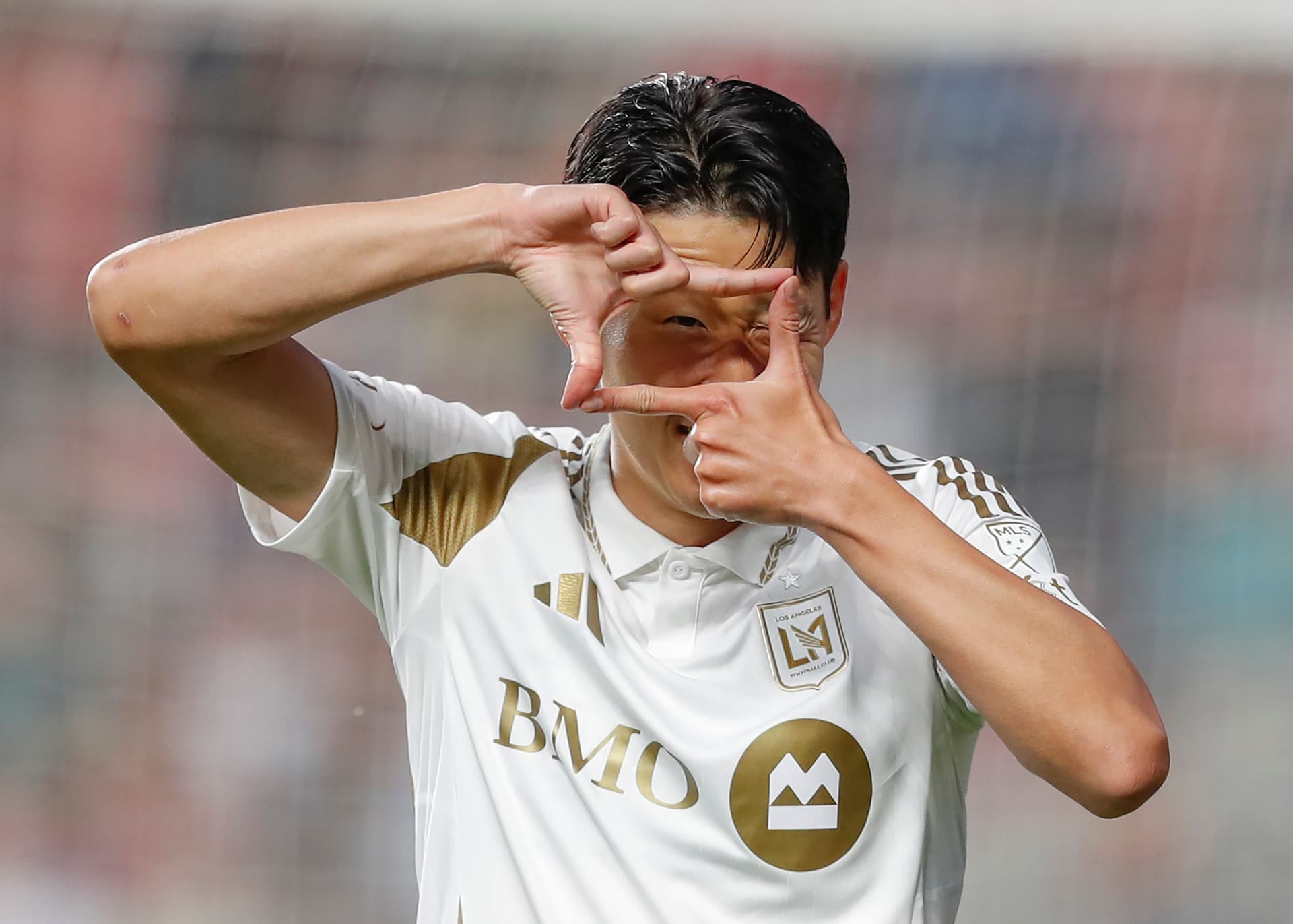 Son Heung-Min #7 of the Los Angeles Football Club reacts after scoring a goal